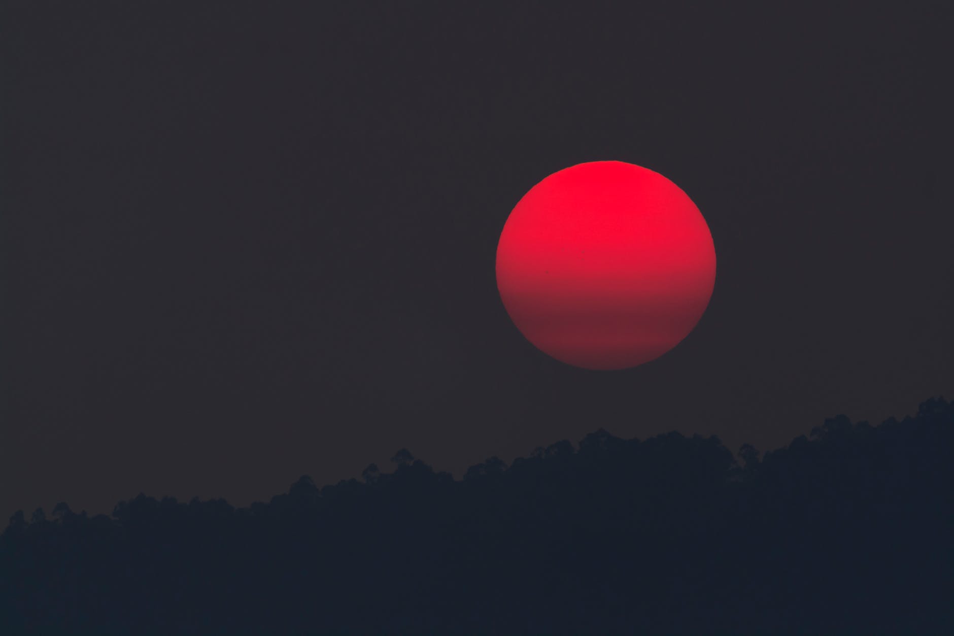 red moon during night time